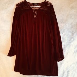 DONATED.     Deep red/ almost rust colored tunic